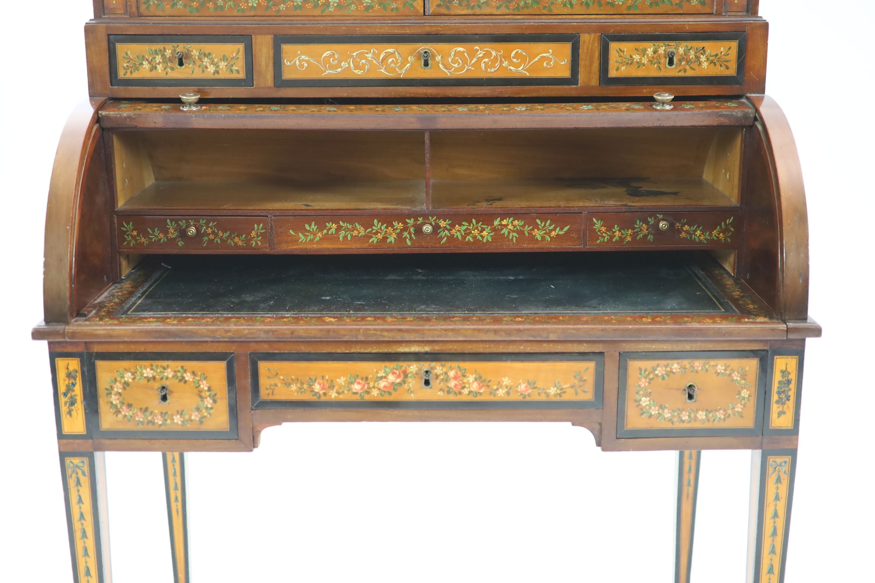 An Edwardian Sheraton Revival painted satinwood cylinder bureau / bonheur du jour H 162cm. W 97cm. D 58cm.